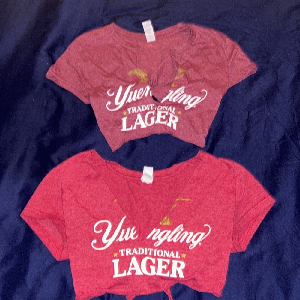 Yuengling crops that tie in the back! One is a brighter red than the other.